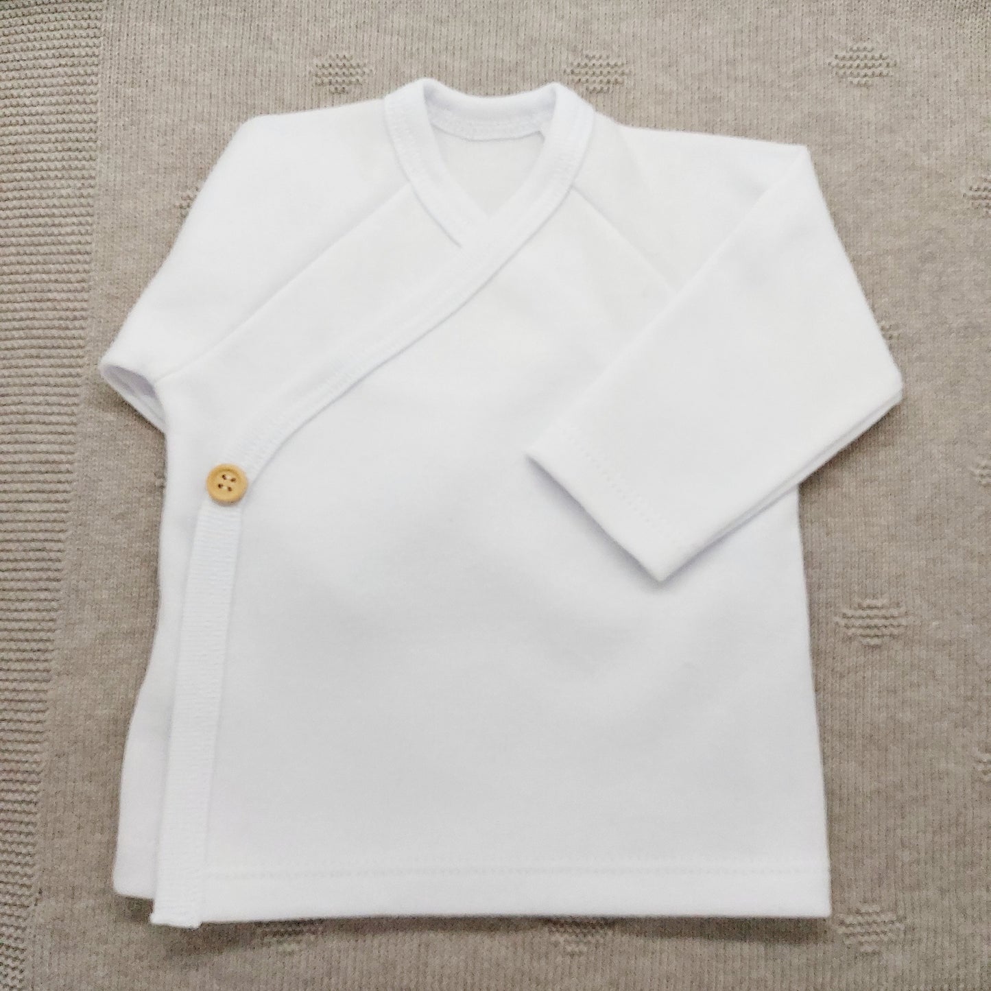 Camiseta cruzada Botón